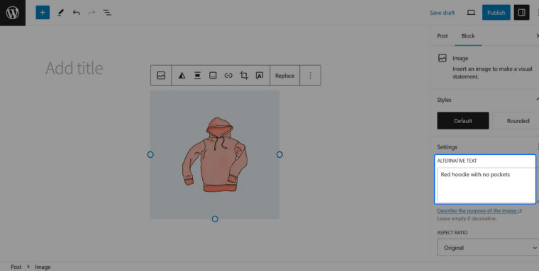 Screenshot of Wordpress block editor; an image of a red hoodie is selected, a field labeled ‘Alternate Text’ contains the text ‘Red hoodie with no pockets’ in the sidebar.