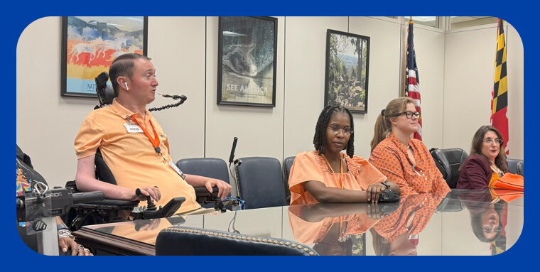 Johs Basile speaking at a panel.