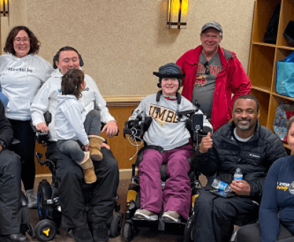 Participants at a nonprofit&rsquo;s adaptive skiing event, sponsored by accessiBe.